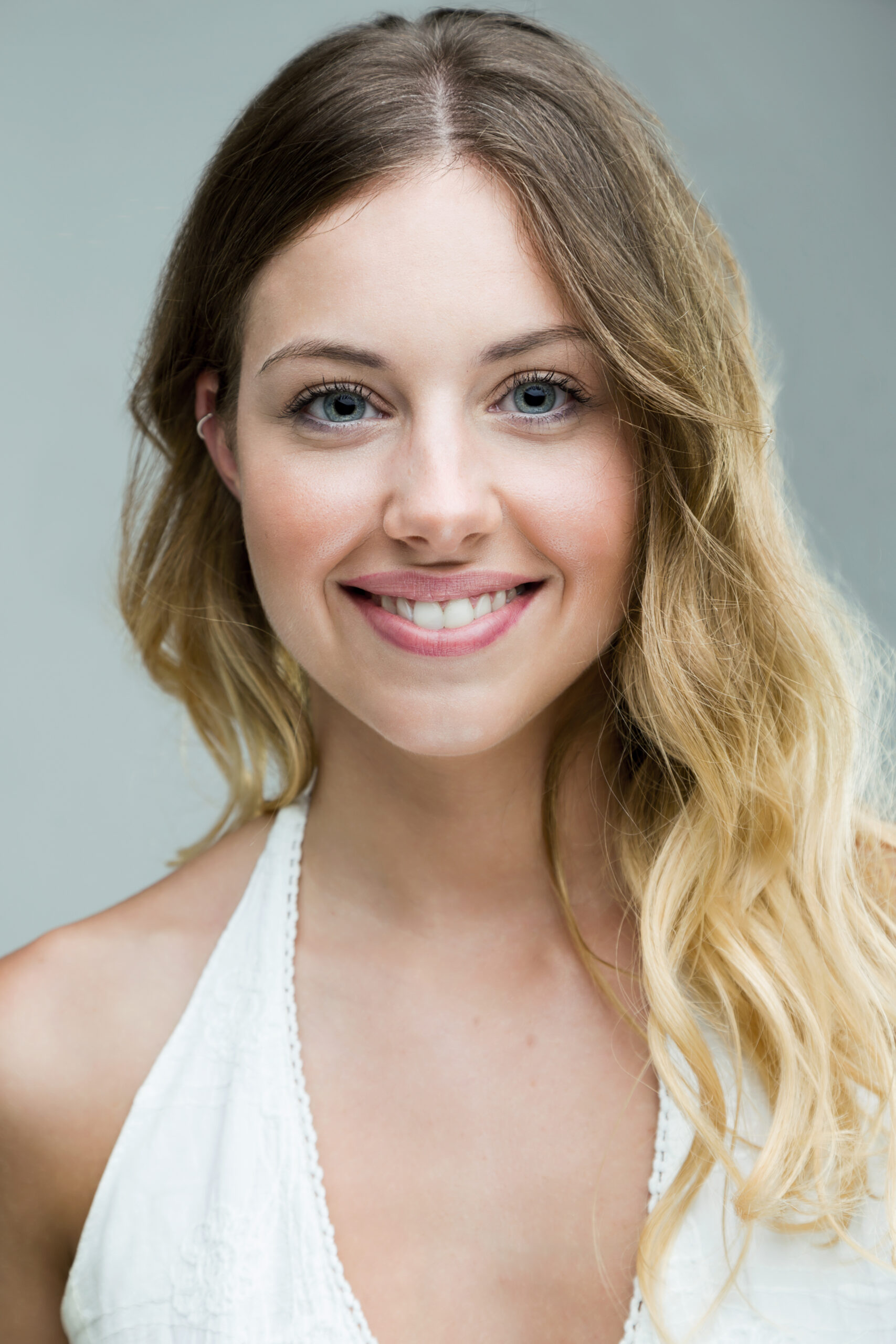 close up of beautiful young woman looking at camera.